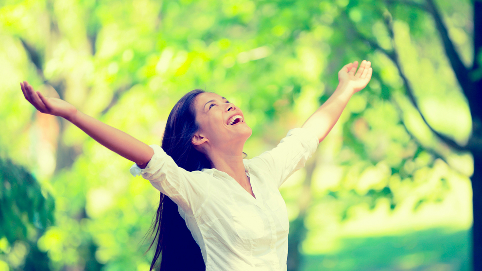 A woman stretching in garden.