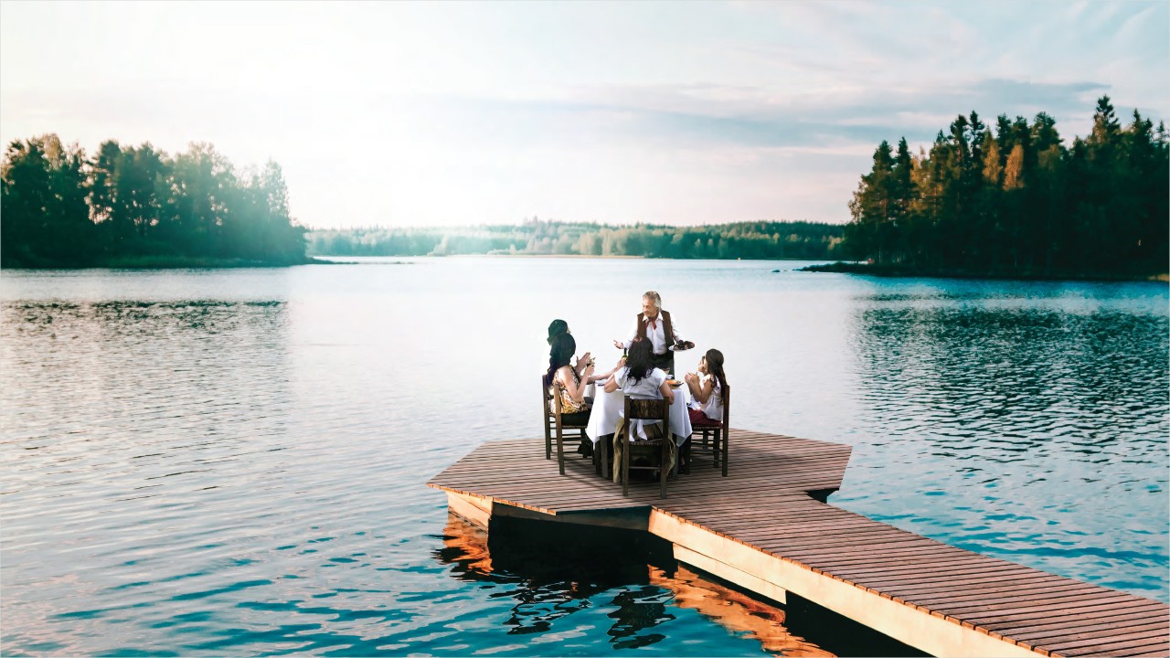 A family dinning at lakeside; image used for HSBC Singapore Life Variable Annuity