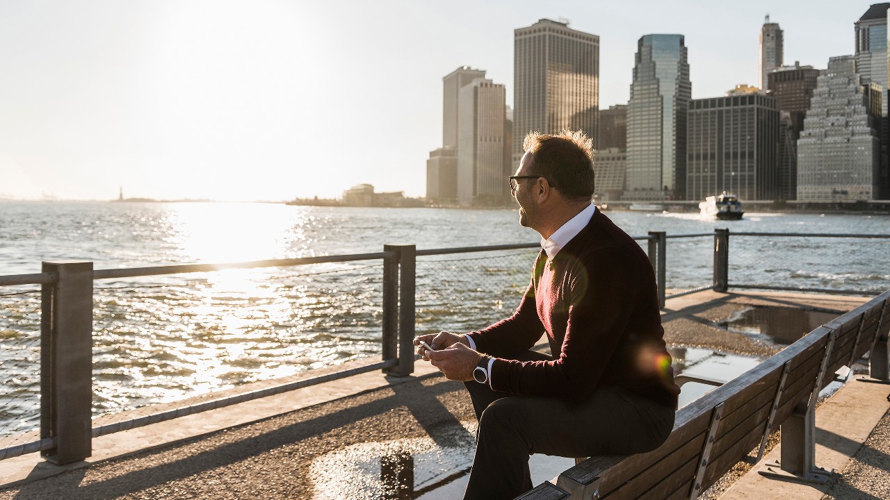 A man is looking at the seaside; image used for HSBC Singapore International Financial Support