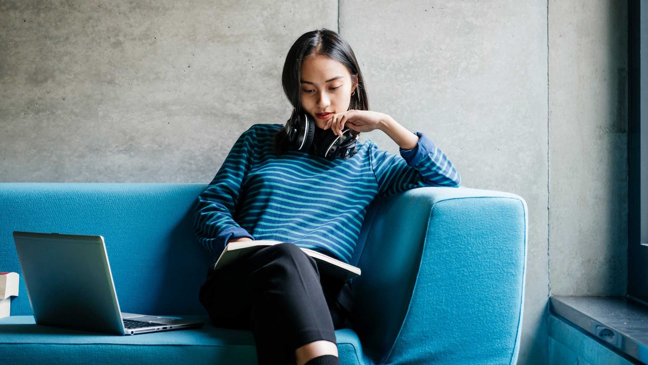 Woman sitting on couch