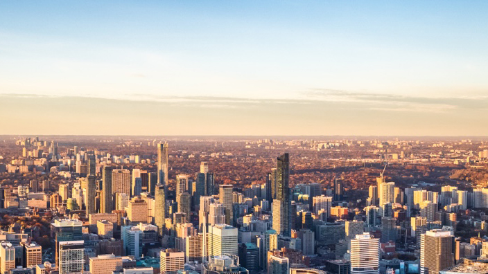 Skyscrapers in city; image used for HSBC international services.