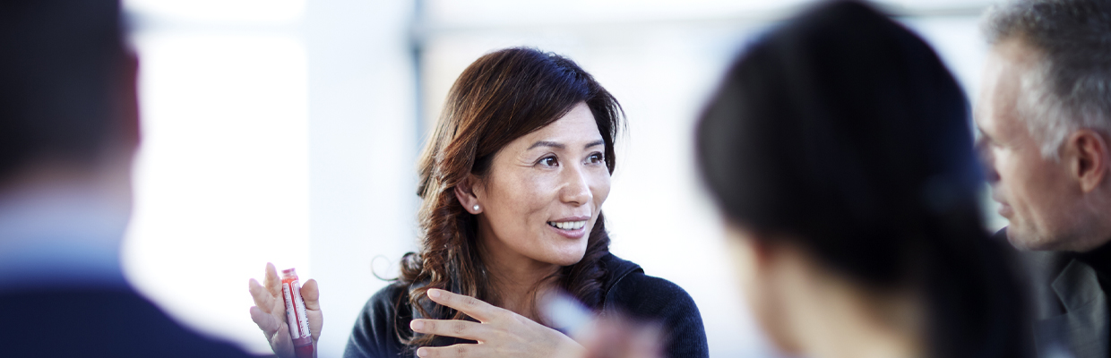 A woman is having a meeting; image used for HSBC Singapore Employee Banking