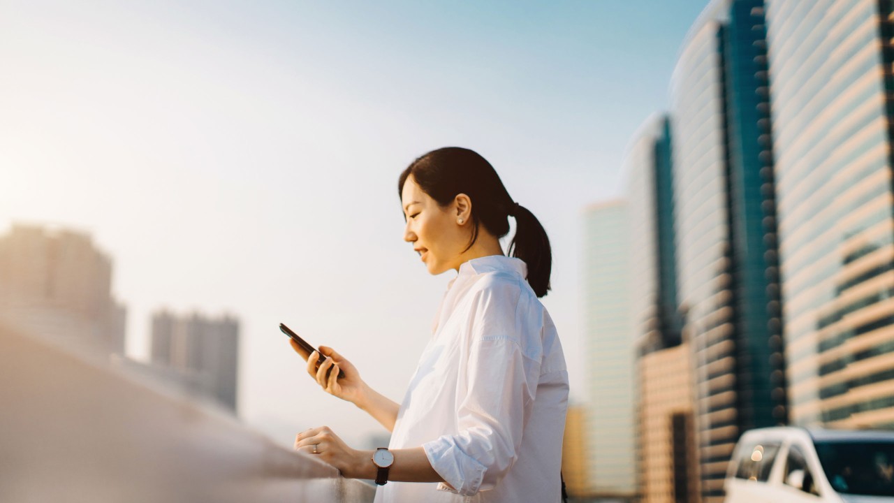 Woman texting on smartphone.