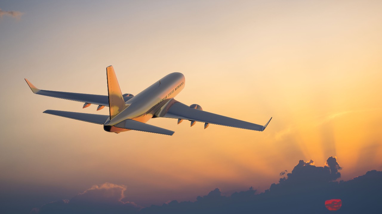 Airplane flying in the sky.