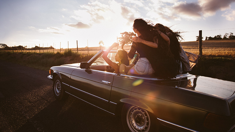 A group of friends are in a car