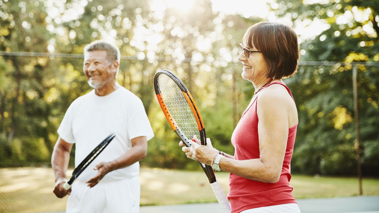 Friends are playing tennis.