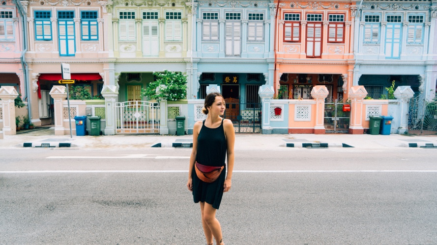 Woman standing in Katong; image used for HSBC Singapore's global neighbourhoods article page