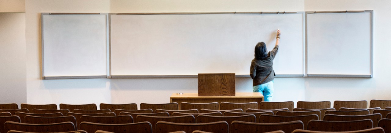 teacher in a classroom; image used for HSBC Four education options for your children