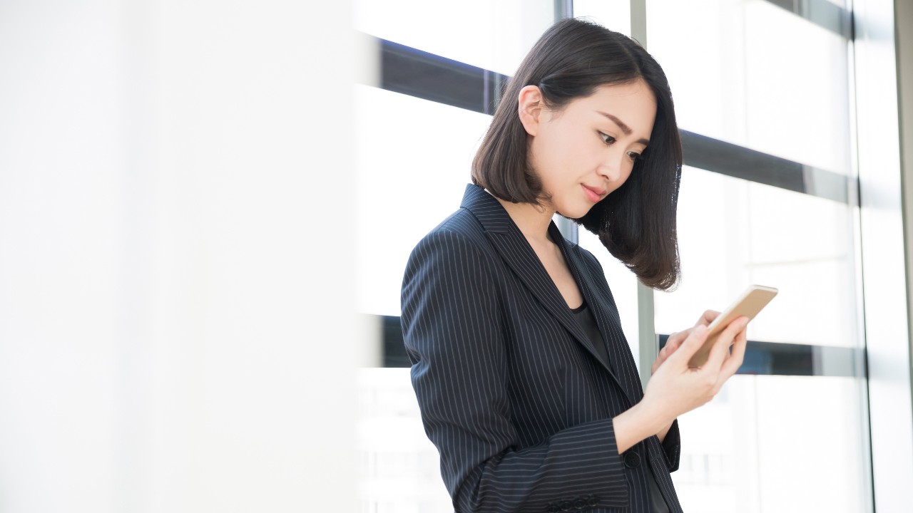 Woman using mobile phone